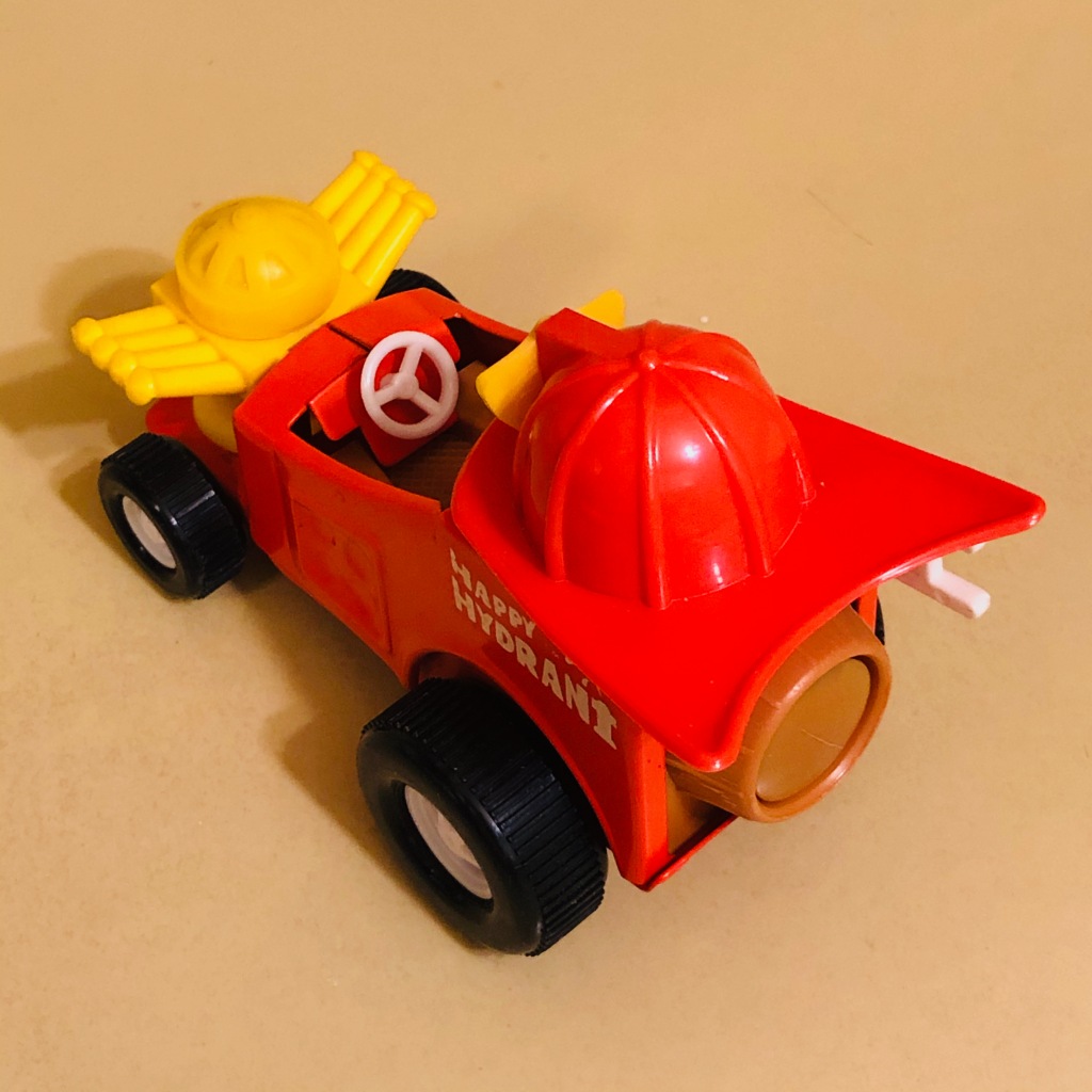 A toy car by Topper Toys called the Zoomer-Boomer Happy Hydrant. It is a show rod or cartoon car.
