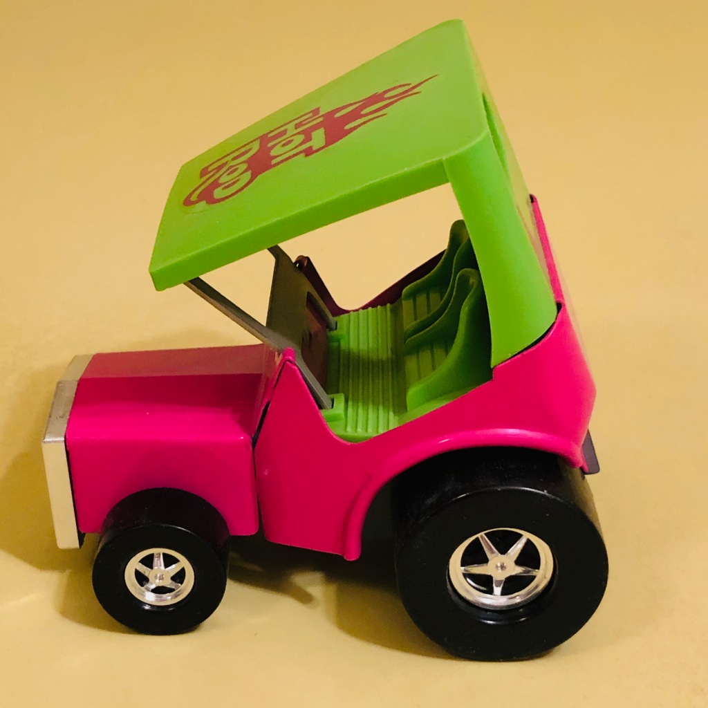 A toy car by Topper Toys called the Zoomer-Boomer Hot Rod. It is a show rod or cartoon car.